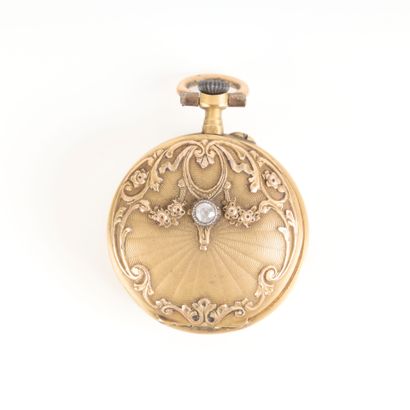 Gold collar watch engraved with scrolls and...