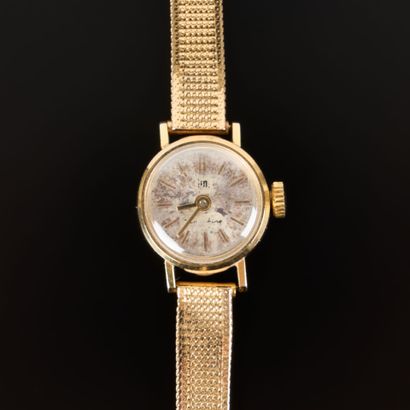 . LIP. Gold ladies' wristwatch, round dial,...