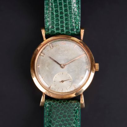 OMEGA. Gold men's wristwatch, plain bezel...