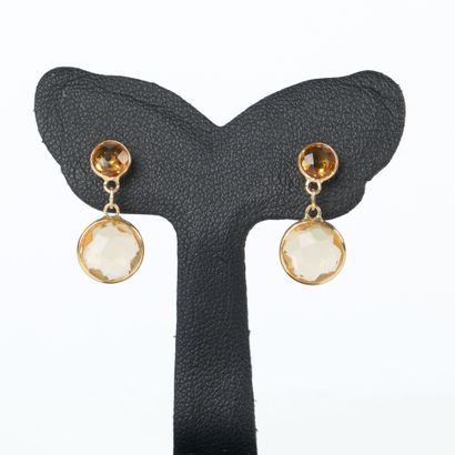 Pair of gold earrings (750‰), each adorned...