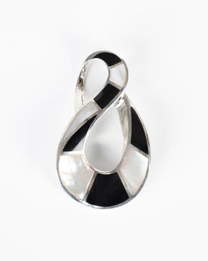 Solid silver pendant with a tendril of onyx...