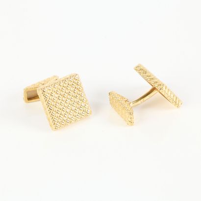 Pair of square gold cufflinks engraved with...