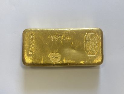 1 numbered gold bar (No. 460533) with its...