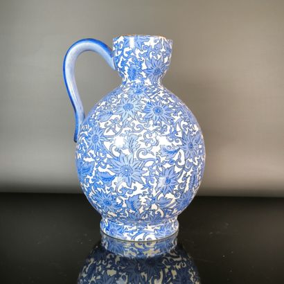 GIEN
Polychrome earthenware pitcher decorated...