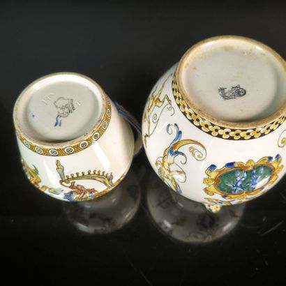 GIEN. Set of two polychrome earthenware pitchers...