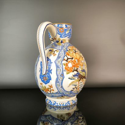 GIEN
Polychrome earthenware pitcher decorated...