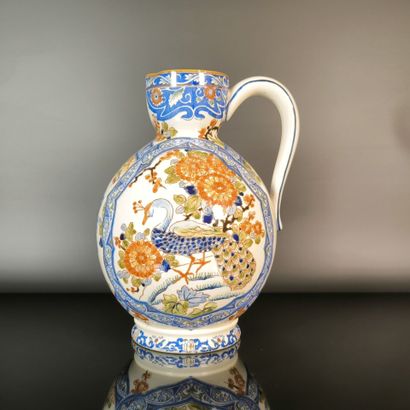 GIEN
Polychrome earthenware pitcher decorated...