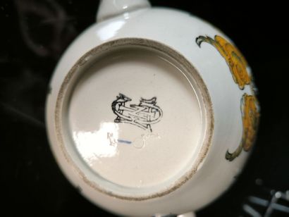 GIEN. A 5-piece set of polychrome earthenware...