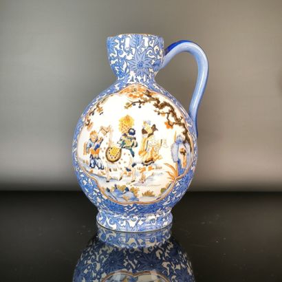 GIEN
Polychrome earthenware pitcher decorated...