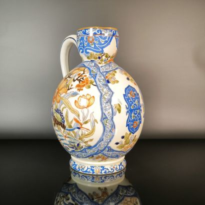 GIEN
Polychrome earthenware pitcher decorated...