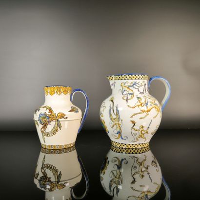 GIEN. Set of two polychrome earthenware pitchers...