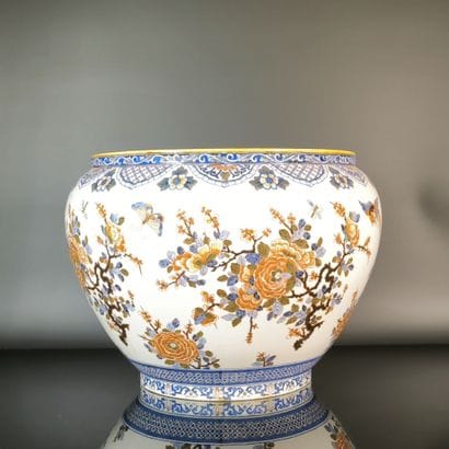 GIEN
Large round polychrome earthenware planter,...