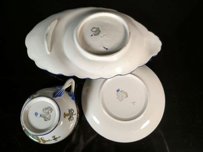 GIEN. A 7-piece set of polychrome earthenware...