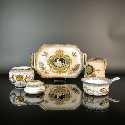 GIEN. A 5-piece set of polychrome earthenware...
