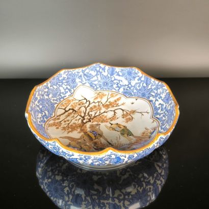 GIEN
Polychrome earthenware bowl with a Chinese-style...