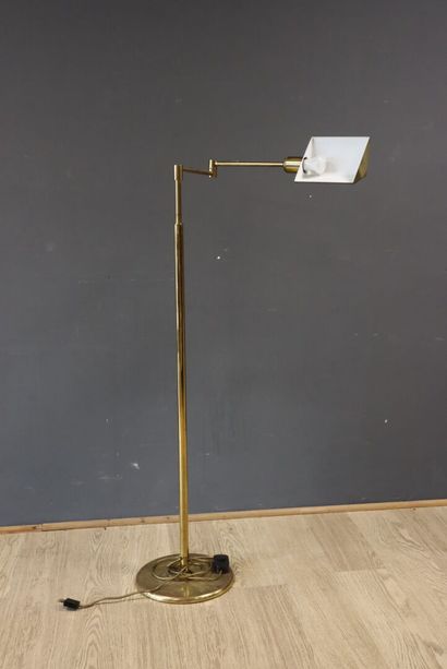 Gold-plated reading lamp with an articulated...