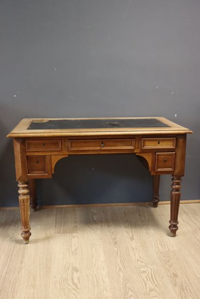 Bureau en bois naturel ouvrant à cinq tiroirs,...