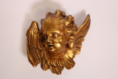 Terracotta piece decorated with a cherub's...