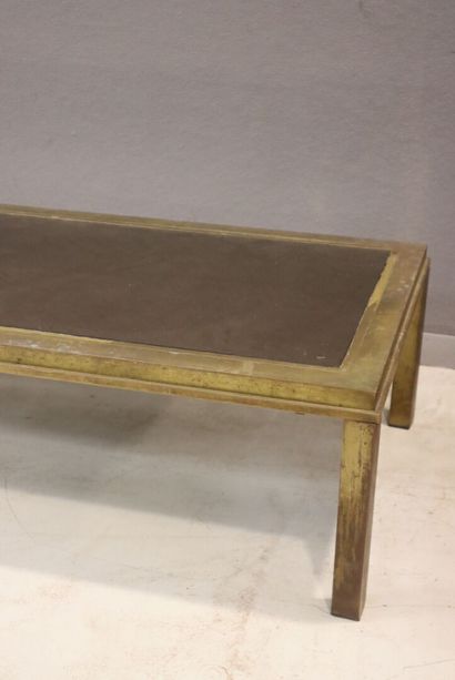 Table basse 
Piètement en laiton à 4 pieds...
