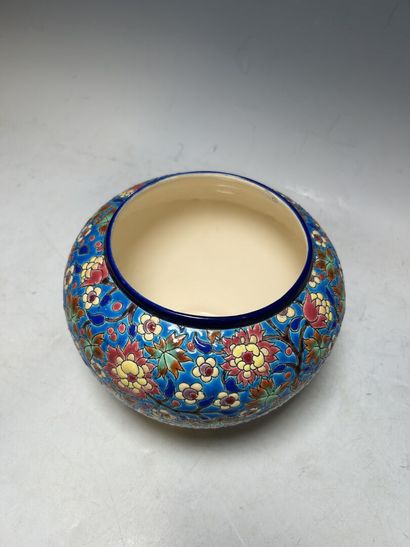 LONGWY. 
Earthenware ball vase with enameled...