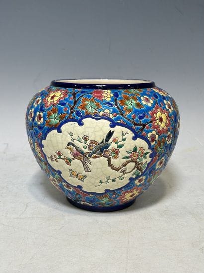 LONGWY. 
Earthenware ball vase with enameled...