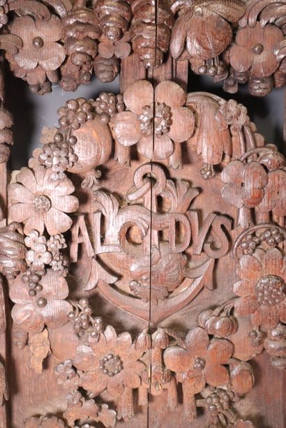 Carved wood panel decorated with flowers,...