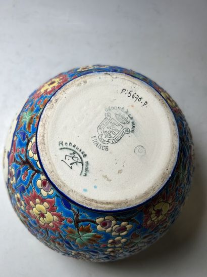 LONGWY. 
Earthenware ball vase with enameled...