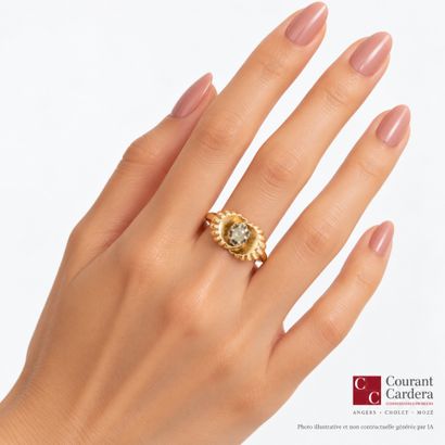 Gold ring with a crisscrossed fluted design,...