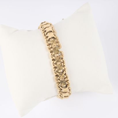 Gold bracelet (750/1000) decorated with four-leaf...