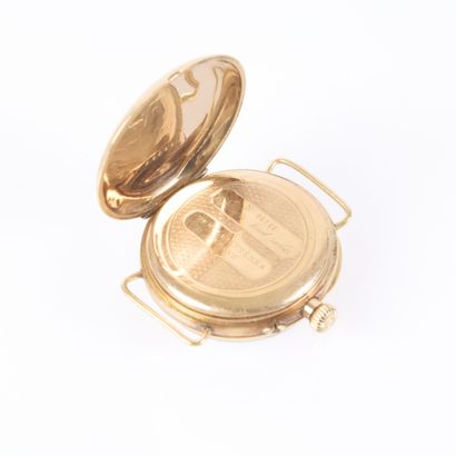 Gold watch bracelet; the dust cover is also...