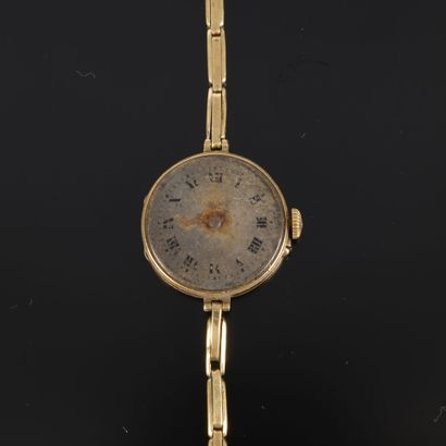 Women's gold wristwatch with a mechanical...