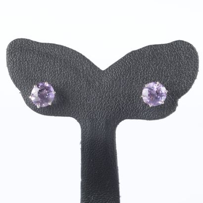 Pair of white gold earrings, each set with...