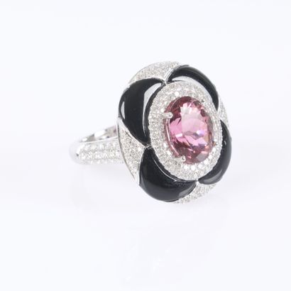 Stunning white gold ring set with an oval-cut...