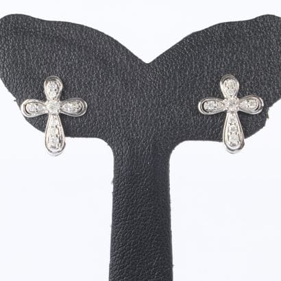 Pair of white gold cross earrings, each set...