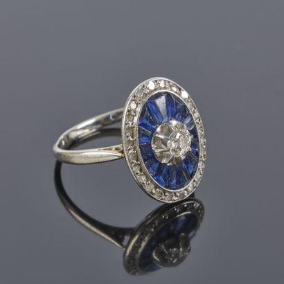 White gold ring featuring an oval-shaped...