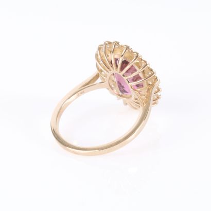 A striking rose gold daisy ring featuring...
