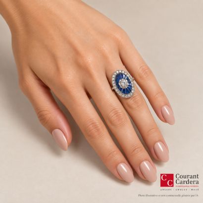 White gold ring featuring an oval-shaped...