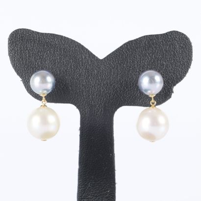 Pair of gold earrings, each featuring an...