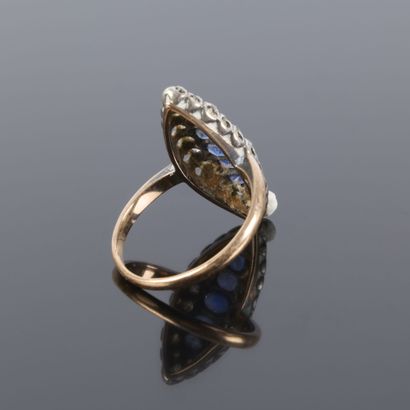 Two-tone gold marquise ring, set with 5 oval...