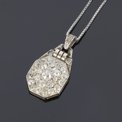 Art Deco pendant featuring a pavé setting...