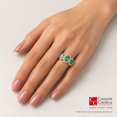 Gold ring set with a cascading row of 5 oval-cut...