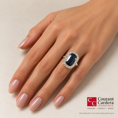 . White gold ring set with a cushion-cut...