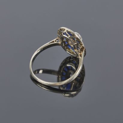 White gold ring featuring an oval-shaped...