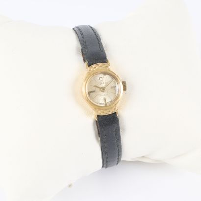Women's gold wristwatch; the mechanical movement...