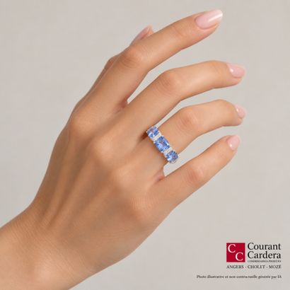 White gold half-eternity ring, set with 3...