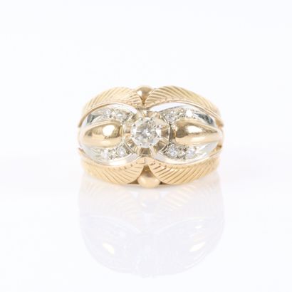 Two-tone gold ring with a leaf motif, set...