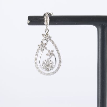 Pair of openwork pear-shaped white gold earrings,...