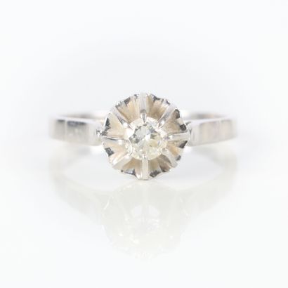 Solitaire ring in white gold set with a modern...