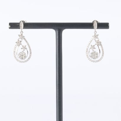 Pair of openwork pear-shaped white gold earrings,...