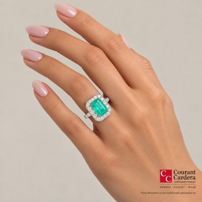 White gold and platinum ring set with an...